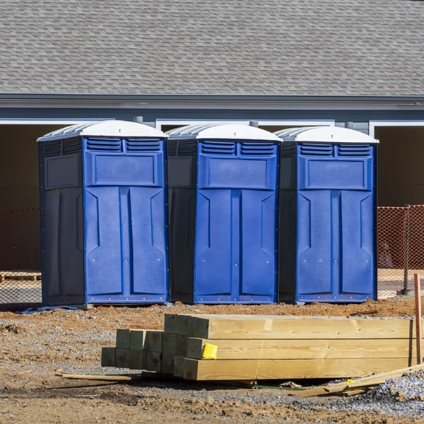 how often are the porta potties cleaned and serviced during a rental period in Holualoa